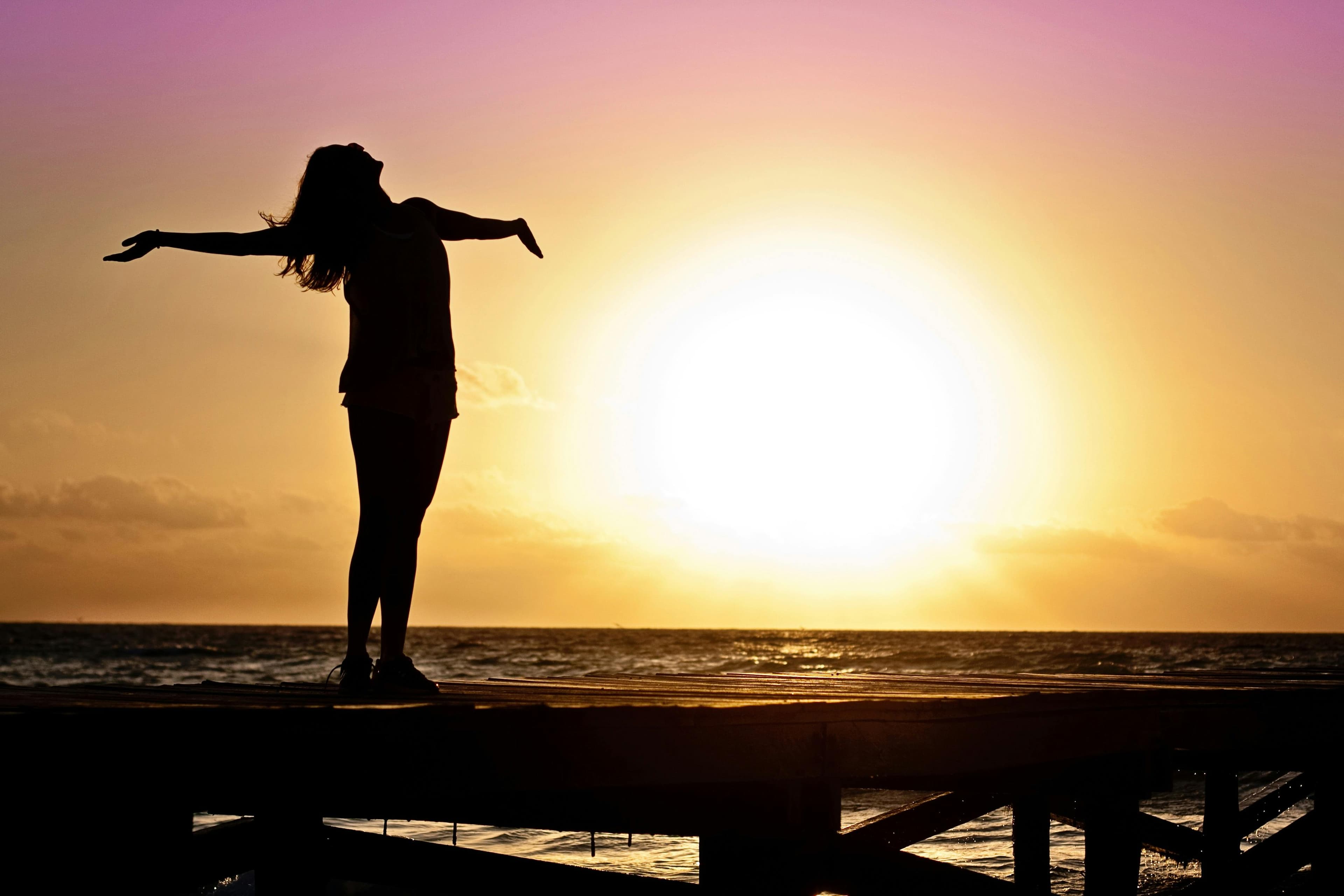 Professional woman at a crossroads, symbolizing life transitions, career changes, and identity shifts that women navigate